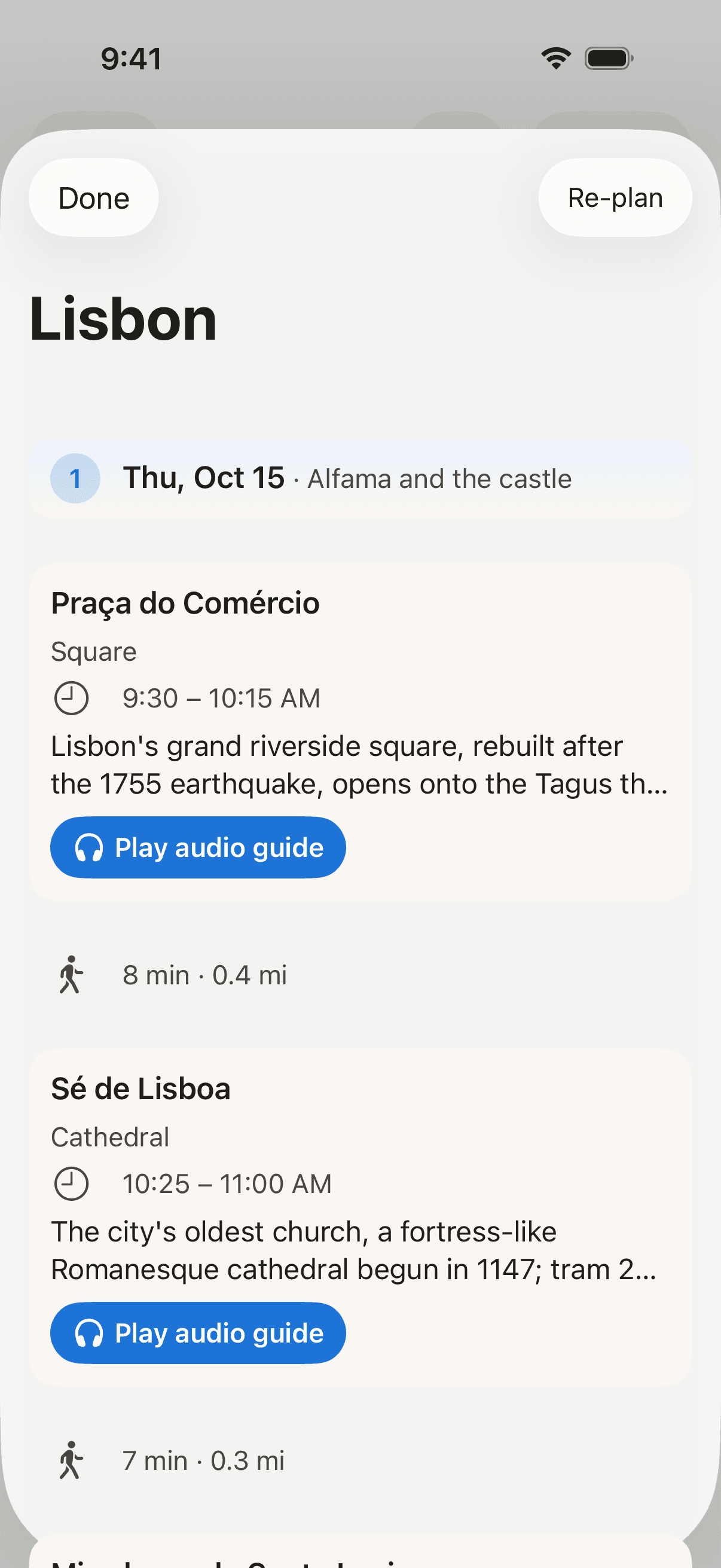 TravelMate day plan for Lisbon with visit times, walking legs between stops and audio guide buttons
