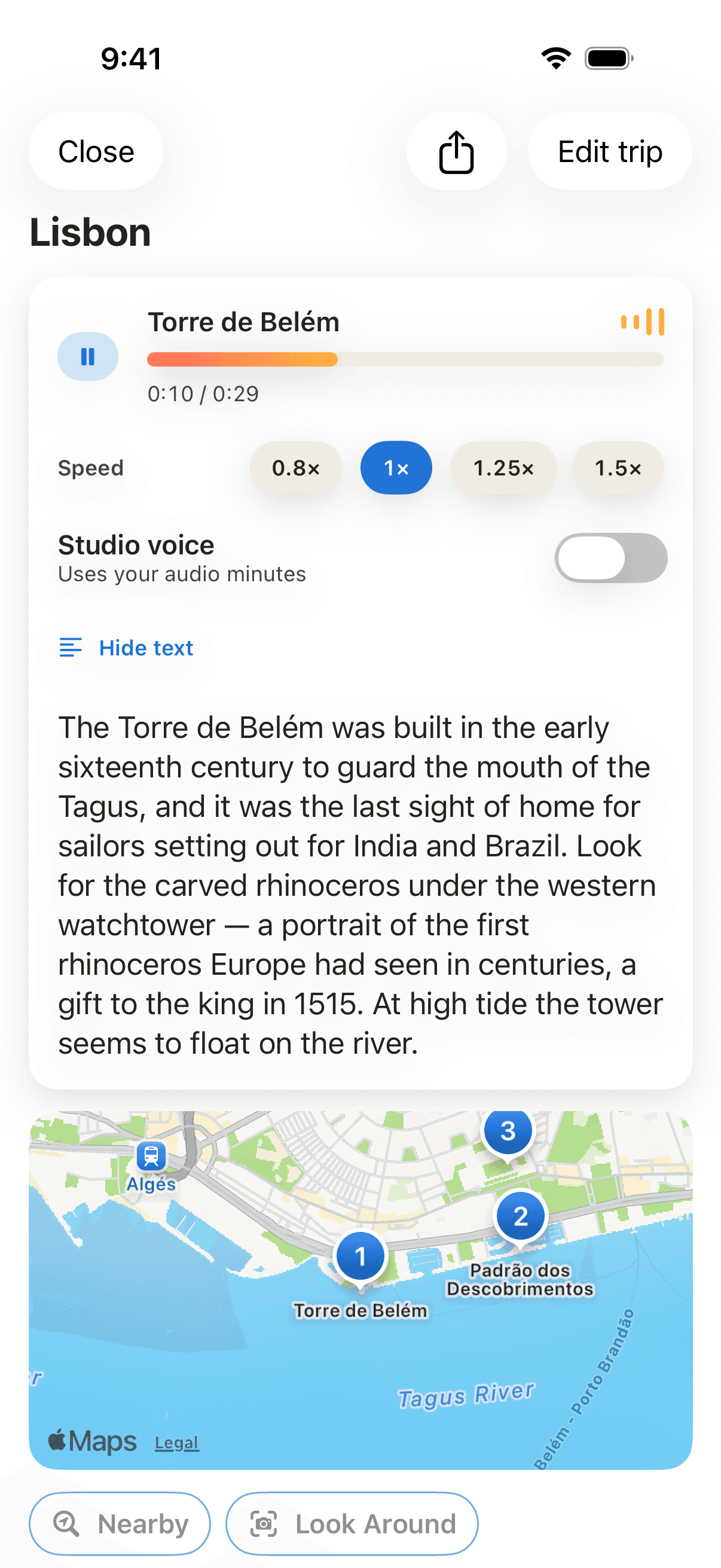 TravelMate audio guide for Torre de Belém playing, with speed controls, the guide text and the day on a map